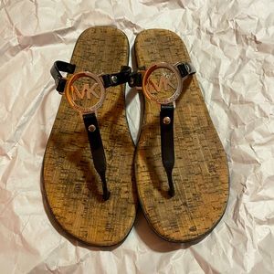 Gently worn Michael Kors  thong sandals size 9 1/2